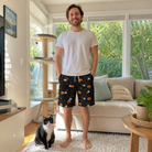 Full-length photo with the pet printed all over this Men's Cackle Carvings Custom Cat Face Beach Shorts