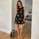 Full-length photo with the pet printed all over this Women's Cackle Carvings Custom Cat Face Tank Dress