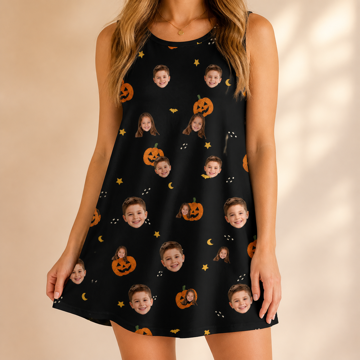 Model wearing Women's Cackle Carvings Custom Face Tank Dress printed with kids' faces