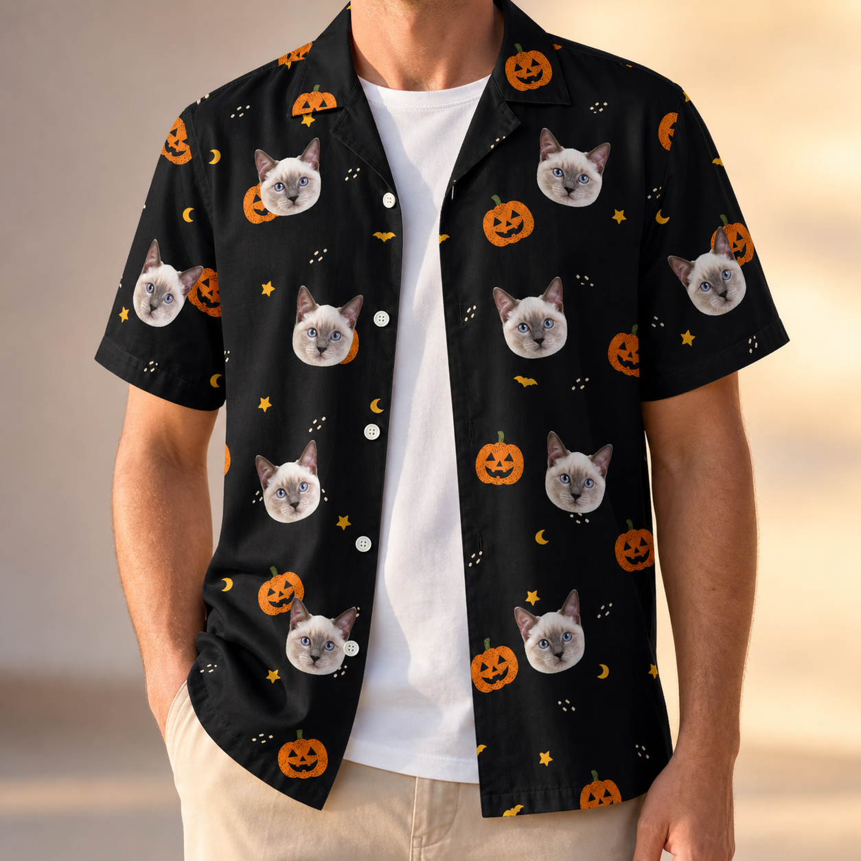 Man wearing Men's Cackle Carvings Custom Cat Face Hawaiian Shirt open over a white tee
