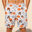 Model wearing Men's Jack O'Jitters Custom Face Beach Shorts printed with kids' faces