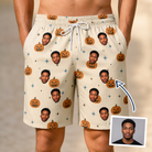Man wearing Men's Lantern Laughs Custom Face Beach Shorts — custom faces printed all-over