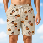 Model wearing Men's Lantern Laughs Custom Face Beach Shorts printed with kids' faces