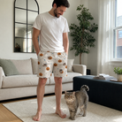 Full-length photo with the pet printed all over this Men's Lantern Laughs Custom Cat Face Beach Shorts
