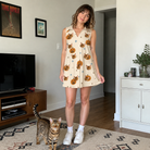 Full-length photo with the pet printed all over this Women's Lantern Laughs Custom Cat Face V-Neck Dress