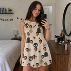 Real-life photo of someone wearing Women's Cryptic Crawlies Custom Face Tank Dress — custom faces printed all-over
