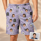 Man wearing Men's Grinning Gravestones Custom Face Beach Shorts — custom faces printed all-over