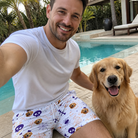 Selfie with the pet whose face is printed all over this Men's Skull Shuffle Custom Dog Face Beach Shorts