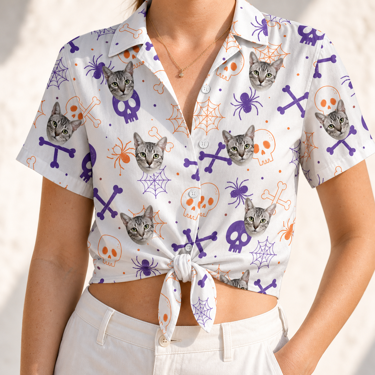 Woman wearing Women's Skull Shuffle Custom Cat Face Hawaiian Shirt tied at the waist