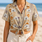 Woman wearing Women's Webbed Bones Custom Dog Face Hawaiian Shirt tied at the waist