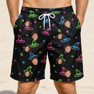 Model wearing Men's Moonlit Millinery Custom Face Beach Shorts printed with kids' faces