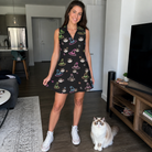 Full-length photo with the pet printed all over this Women's Moonlit Millinery Custom Cat Face V-Neck Dress