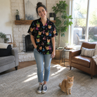 Full-length photo with the pet printed all over this Women's Moonlit Millinery Custom Cat Face Hawaiian Shirt