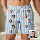 Man wearing Men's Wicked Peaks Custom Face Beach Shorts — custom faces printed all-over
