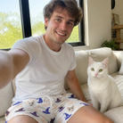 Selfie with the pet whose face is printed all over this Men's Cauldron Crowns Custom Cat Face Beach Shorts