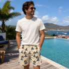 Real-life photo of someone wearing Men's Witchy Whirl Custom Face Beach Shorts — custom faces printed all-over