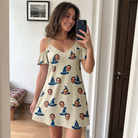 Real-life photo of someone wearing Women's Witchy Whirl Custom Face Off-Shoulder Dress — custom faces printed all-over