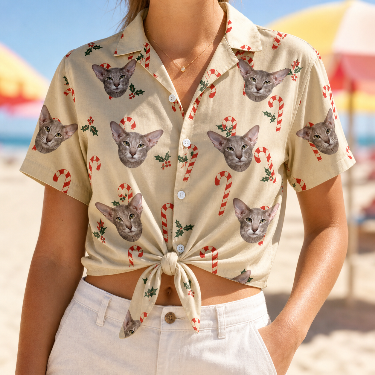 Woman wearing Women's Minty Mistletoe Custom Cat Face Hawaiian Shirt tied at the waist