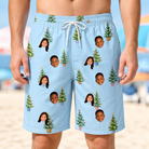 Model wearing Men's Spruce Spectacle Custom Face Beach Shorts printed with kids' faces
