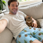 Selfie with the pet whose face is printed all over this Men's Spruce Spectacle Custom Cat Face Beach Shorts