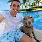 Selfie with the pet whose face is printed all over this Men's Spruce Spectacle Custom Dog Face Beach Shorts