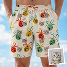 Man wearing Men's Sleigh Bells Custom Cat Face Beach Shorts — custom faces printed all-over