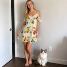 Full-length photo with the pet printed all over this Women's Sleigh Bells Custom Cat Face Off-Shoulder Dress