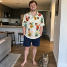 Full-length photo with the pet printed all over this Men's Sleigh Bells Custom Cat Face Polo Shirt