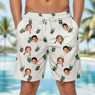 Model wearing Men's Gifts Afoot Custom Face Beach Shorts printed with kids' faces