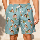 Model wearing Men's Cane Carousel Custom Face Beach Shorts printed with kids' faces
