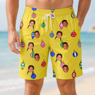 Model wearing Men's Tree Trinkets Custom Face Beach Shorts printed with kids' faces