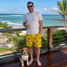 Full-length photo with the pet printed all over this Men's Tree Trinkets Custom Dog Face Beach Shorts