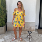 Full-length photo with the pet printed all over this Women's Tree Trinkets Custom Dog Face Off-Shoulder Dress