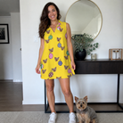 Full-length photo with the pet printed all over this Women's Tree Trinkets Custom Dog Face V-Neck Dress