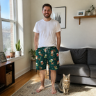 Full-length photo with the pet printed all over this Men's Chimney Cheer Custom Cat Face Beach Shorts