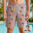 Man wearing Men's Flurry Fanfare Custom Face Beach Shorts — custom faces printed all-over