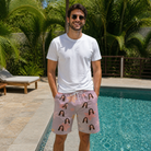 Real-life photo of someone wearing Men's Flurry Fanfare Custom Face Beach Shorts — custom faces printed all-over