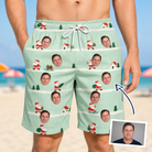 Man wearing Men's Claus Carnival Custom Face Beach Shorts — custom faces printed all-over