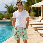 Real-life photo of someone wearing Men's Claus Carnival Custom Face Beach Shorts — custom faces printed all-over