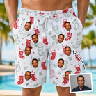 Man wearing Men's Yule Pouches Custom Face Beach Shorts — custom faces printed all-over