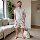 Full-length photo with the pet printed all over this Men's Yule Pouches Custom Cat Face Beach Shorts