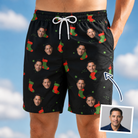 Man wearing Men's Stocking Stuffer Custom Face Beach Shorts — custom faces printed all-over