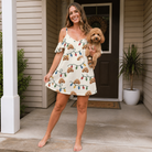 Full-length photo with the pet printed all over this Women's Twinkle Tangled Custom Dog Face Off-Shoulder Dress