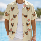 Man wearing Men's Poinsettia Pop Custom Dog Face Hawaiian Shirt open over a white tee