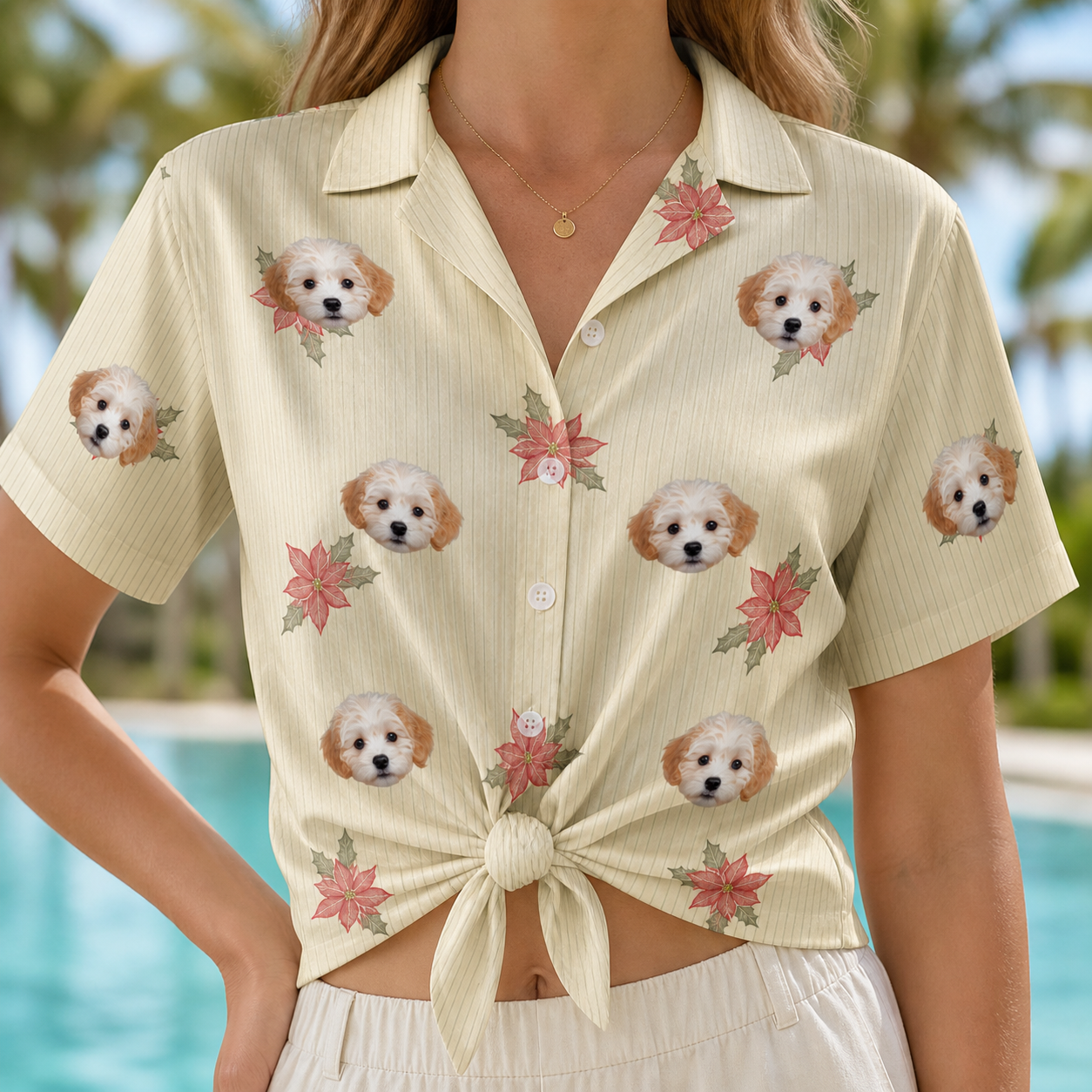 Woman wearing Women's Poinsettia Pop Custom Dog Face Hawaiian Shirt tied at the waist