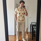 Full-length photo with the pet printed all over this Men's Poinsettia Pop Custom Cat Face Polo Shirt