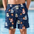 Model wearing Men's Snowman Shenanigans Custom Face Beach Shorts printed with kids' faces