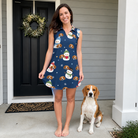 Full-length photo with the pet printed all over this Women's Snowman Shenanigans Custom Dog Face V-Neck Dress