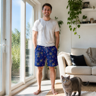 Full-length photo with the pet printed all over this Men's Peppermint Pizzazz Custom Cat Face Beach Shorts