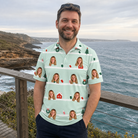 Real-life photo of someone wearing Men's Neon Noel Custom Face Polo Shirt — custom faces printed all-over
